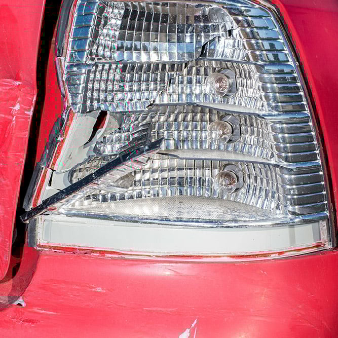 Damaged vehicle headlight